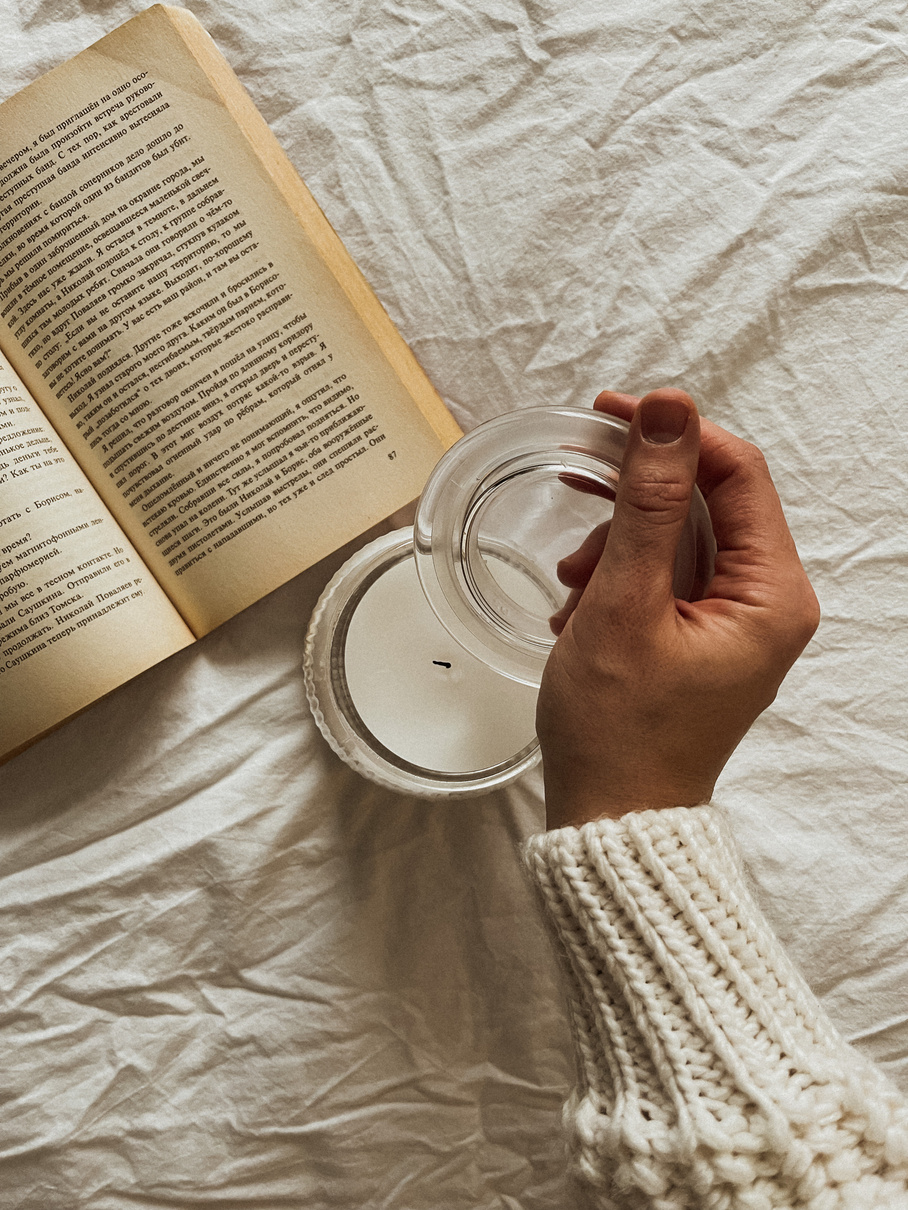 An Open Book Near the Candle